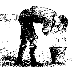 Scout washing in a bucket